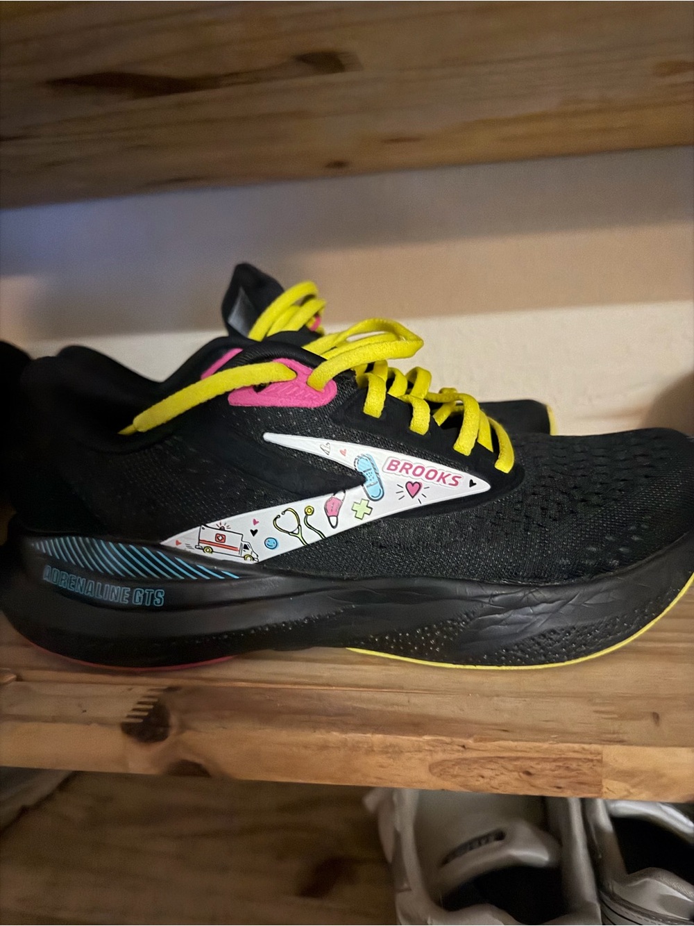 Brooks Kids Black Sneakers with Yellow Laces and Pink Accents